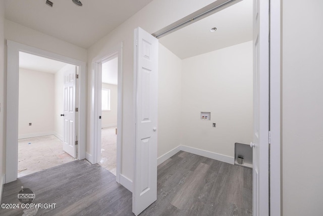 laundry area featuring washer hookup and dark hardwood / wood-style floors