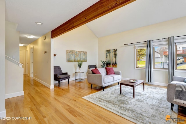 living area with vaulted ceiling with beams, baseboards, recessed lighting, and wood finished floors