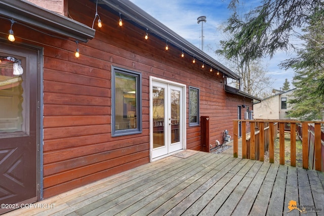 wooden terrace featuring french doors