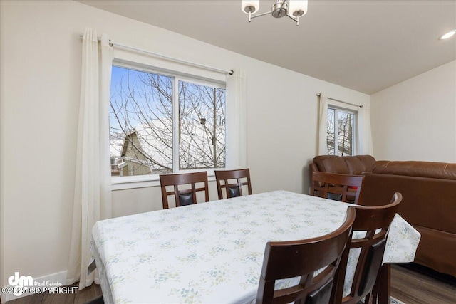 dining space featuring dark hardwood / wood-style floors