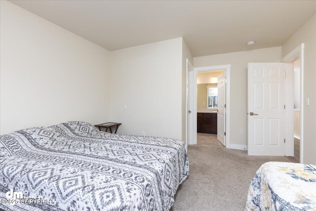 bedroom featuring light colored carpet