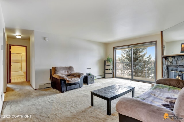 living area featuring light carpet, a baseboard heating unit, and a stone fireplace