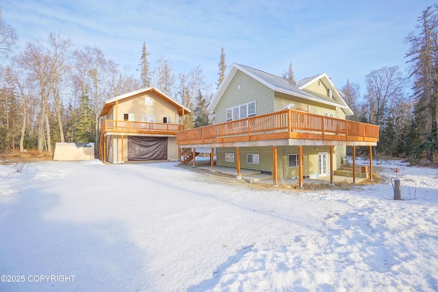 view of front of property featuring a deck