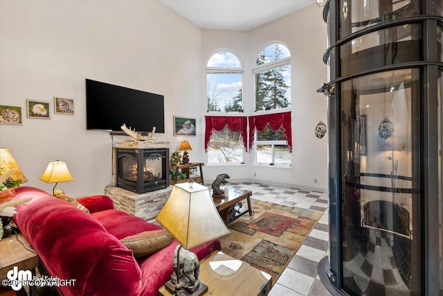 living room featuring a towering ceiling