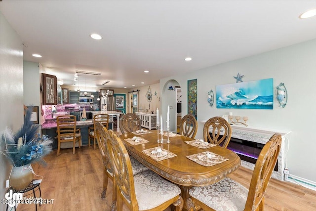 dining space featuring hardwood / wood-style floors