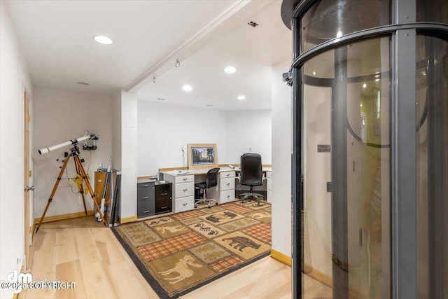 office space featuring light wood-type flooring