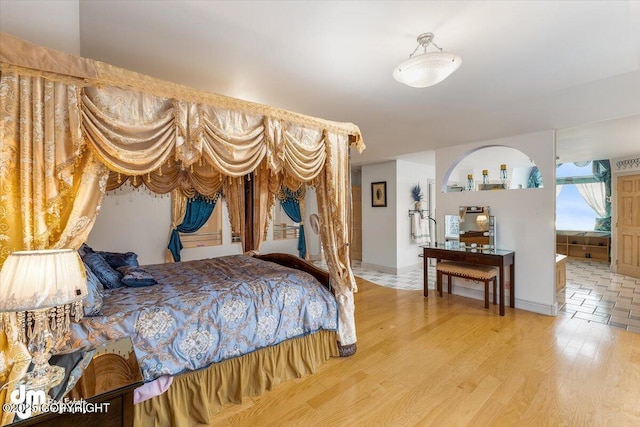 bedroom with wood-type flooring