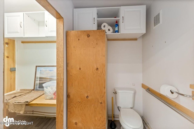 bathroom featuring toilet