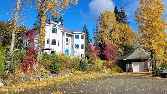 view of front of property with a garage