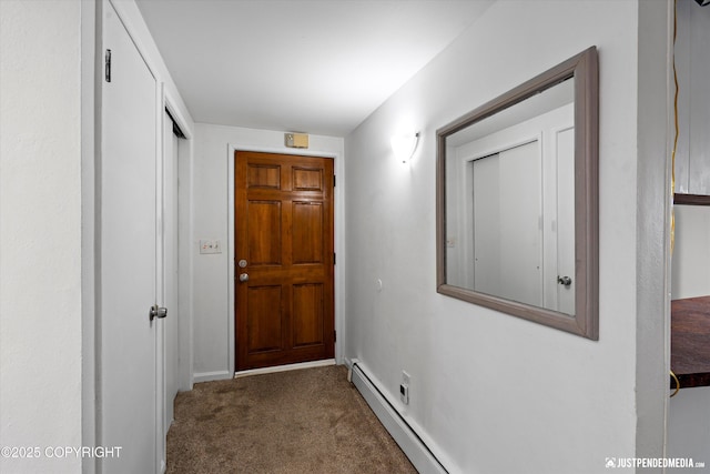 entryway featuring dark carpet