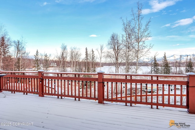 view of snow covered deck