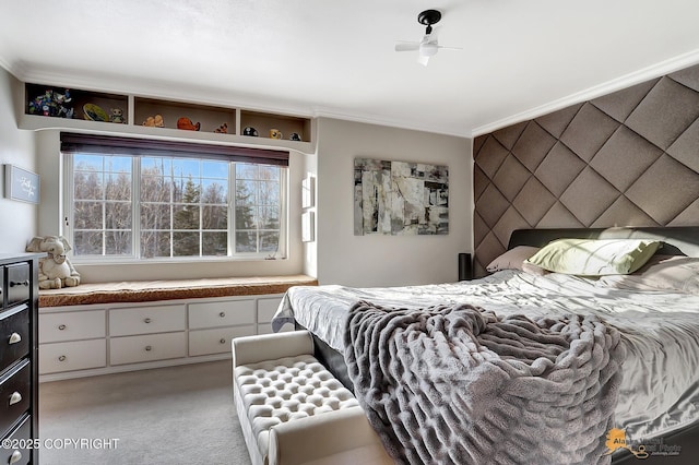 carpeted bedroom featuring crown molding