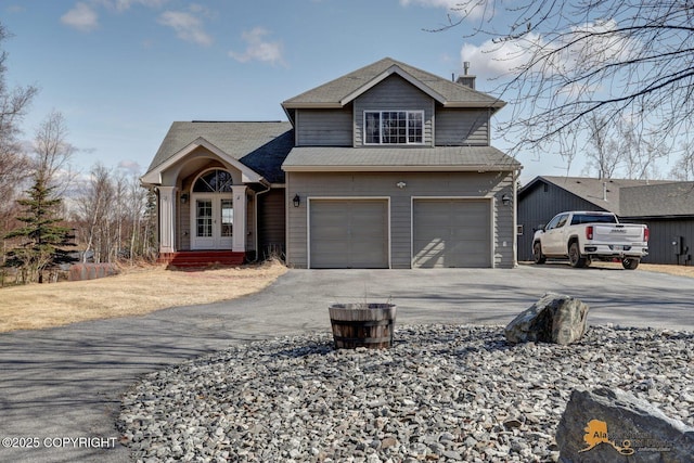3871 E Cottonwood Way, Wasilla, AK 99654 - view of front of property with driveway and a garage