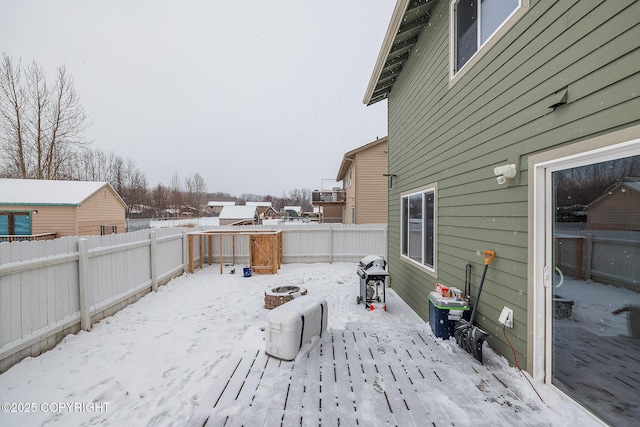 view of yard layered in snow