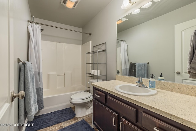 full bathroom with vanity, shower / bath combo, and toilet