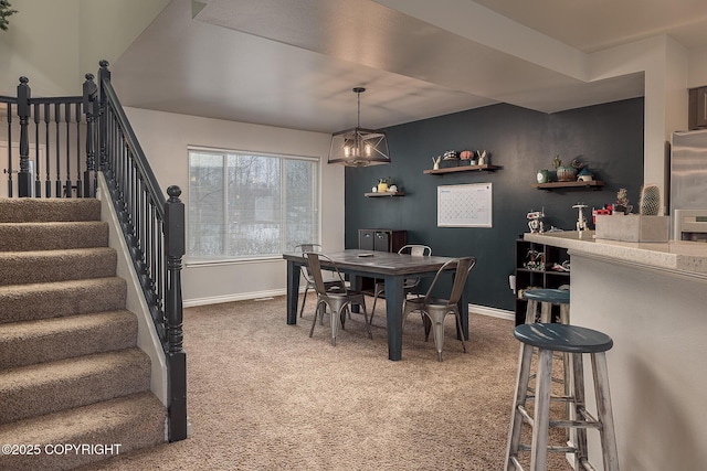 view of carpeted dining room