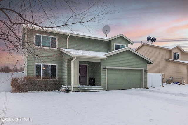 front of property featuring a garage