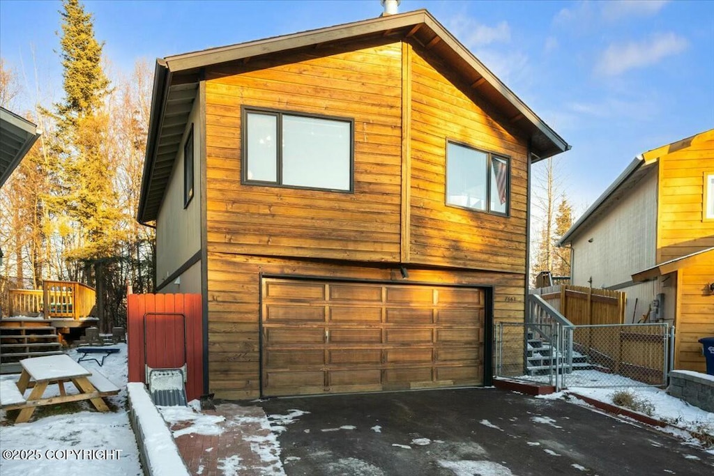 exterior space with a garage