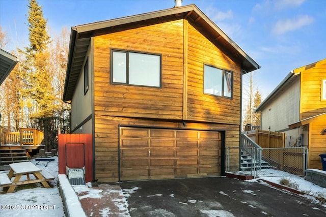 exterior space with a garage