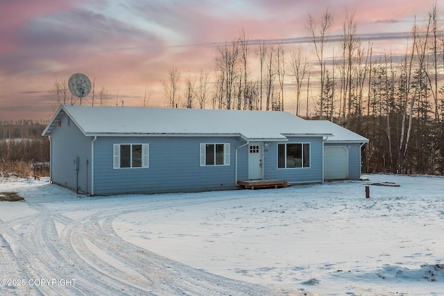 ranch-style house with a garage