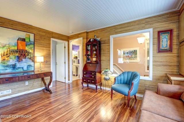 sitting room featuring hardwood / wood-style floors