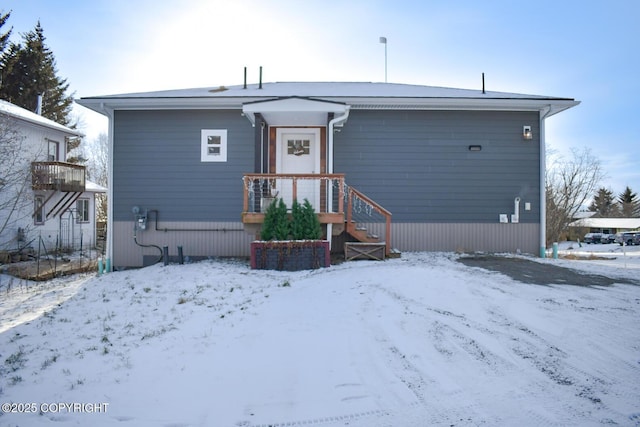 view of snow covered property