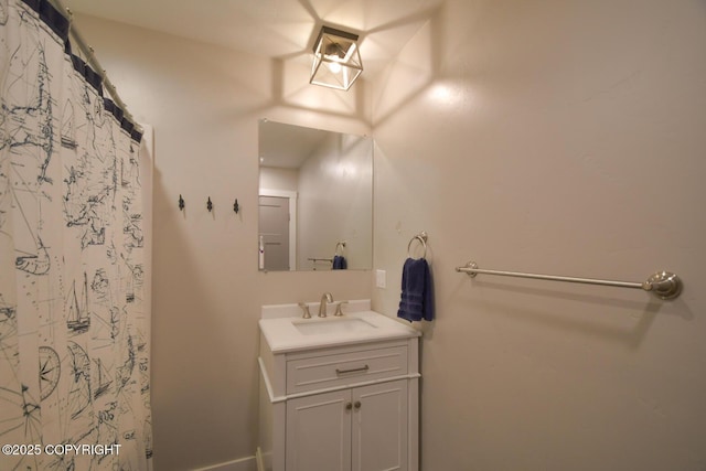 bathroom featuring vanity and a shower with curtain