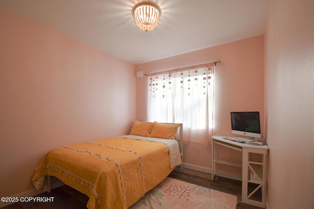 bedroom featuring hardwood / wood-style floors