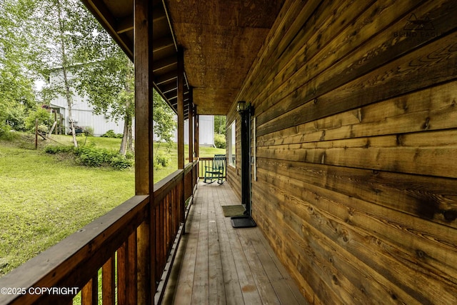 6976 W Windsor Dr, Wasilla, AK 99623 - deck with a lawn