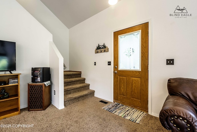 6976 W Windsor Dr, Wasilla, AK 99623 - carpeted entrance foyer with stairs and lofted ceiling