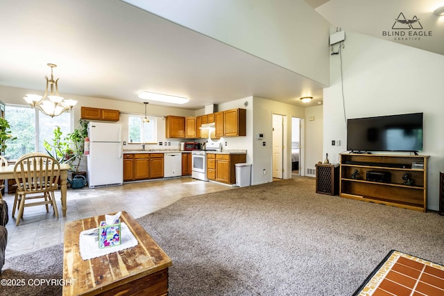 6976 W Windsor Dr, Wasilla, AK 99623 - living area with a chandelier