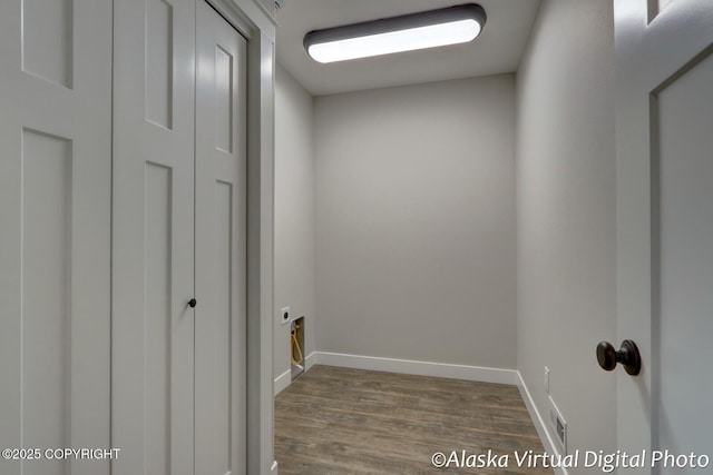 laundry area featuring hardwood / wood-style flooring