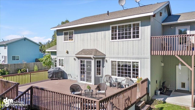 rear view of house with a deck