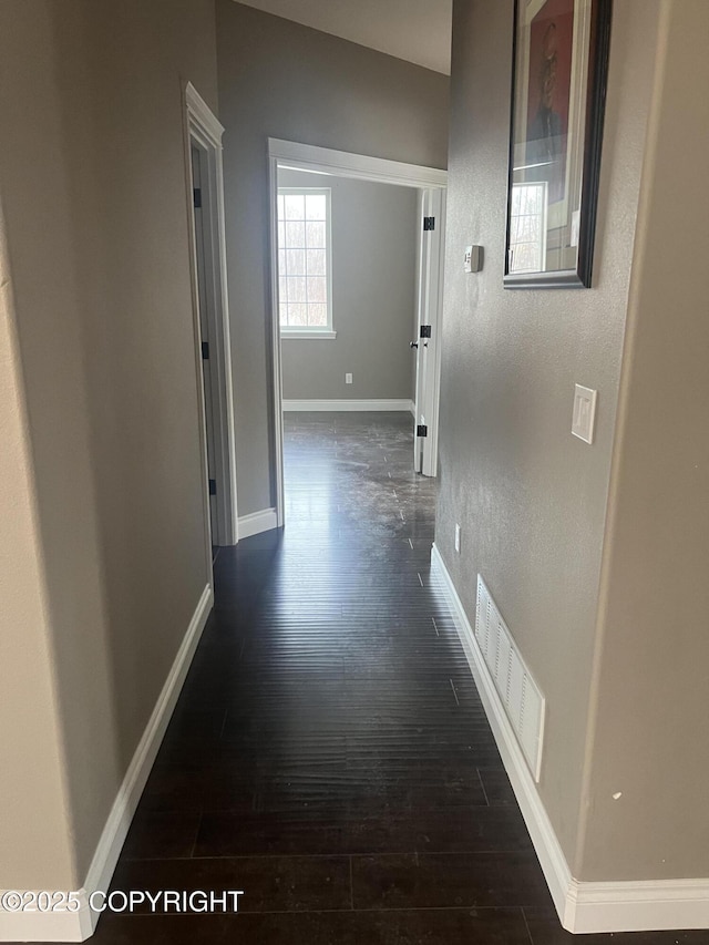 hall featuring dark hardwood / wood-style floors