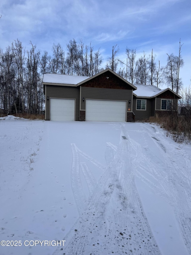 ranch-style house featuring a garage