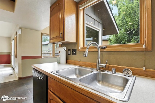 2629 Legacy Dr, Anchorage, AK 99516 - kitchen featuring black dishwasher, brown cabinets, and light countertops