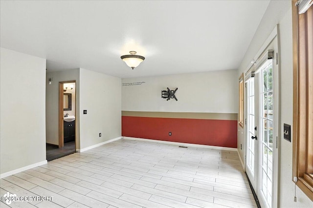 2629 Legacy Dr, Anchorage, AK 99516 - unfurnished room featuring baseboards and wood finished floors