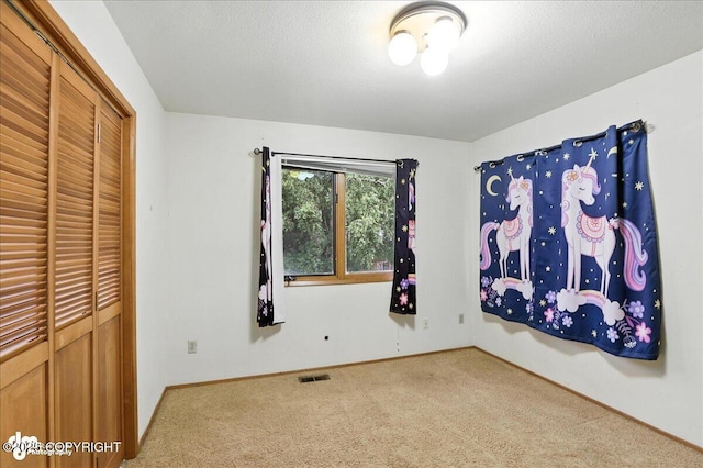 2629 Legacy Dr, Anchorage, AK 99516 - unfurnished bedroom with carpet floors and a closet