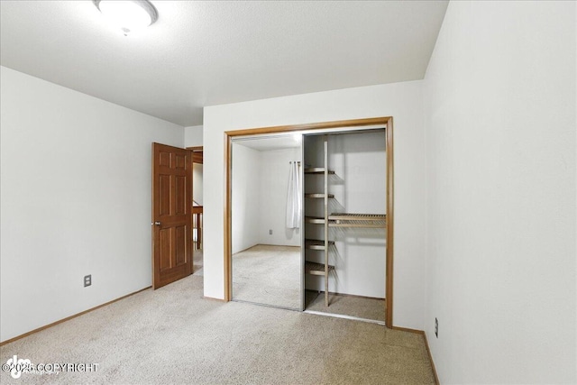2629 Legacy Dr, Anchorage, AK 99516 - unfurnished bedroom with a closet and carpet flooring
