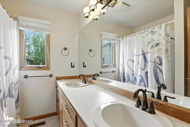 2629 Legacy Dr, Anchorage, AK 99516 - full bath featuring double vanity and tile patterned floors