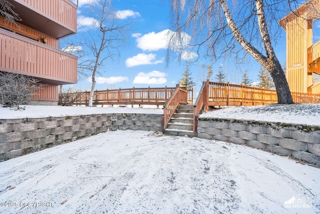 view of yard layered in snow