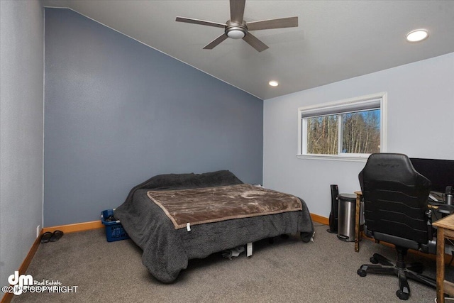 bedroom featuring lofted ceiling, carpet floors, and ceiling fan