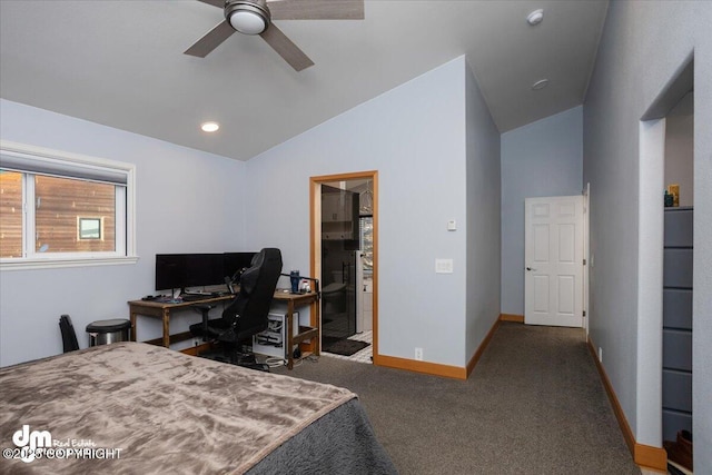 bedroom with lofted ceiling, connected bathroom, and carpet flooring