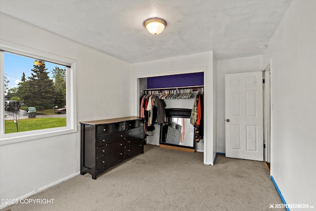 1510 E 40th Ct, Anchorage, AK 99508 - unfurnished bedroom featuring carpet and a closet