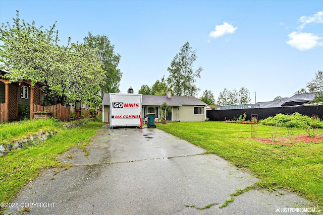 1510 E 40th Ct, Anchorage, AK 99508 - view of front of home featuring driveway