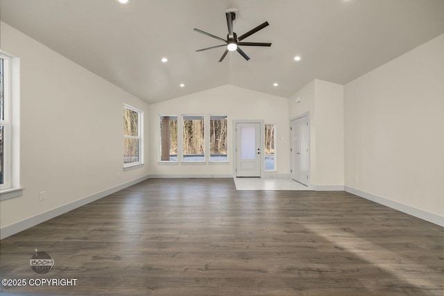 unfurnished living room featuring high vaulted ceiling, dark hardwood / wood-style floors, and ceiling fan