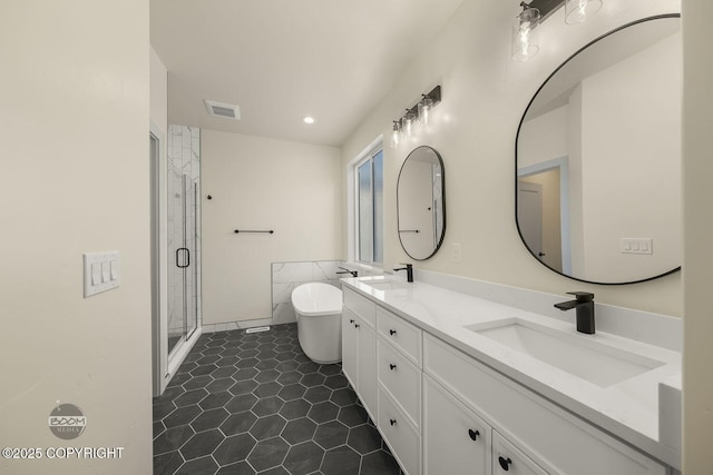 bathroom with vanity, tile patterned floors, and separate shower and tub