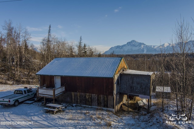 exterior space featuring a mountain view