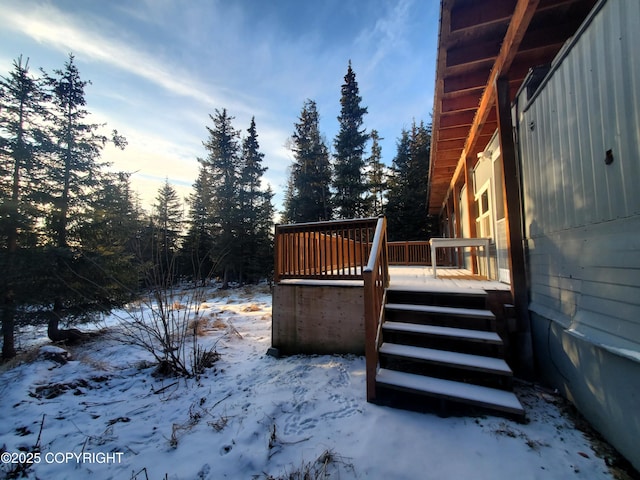 view of snow covered deck