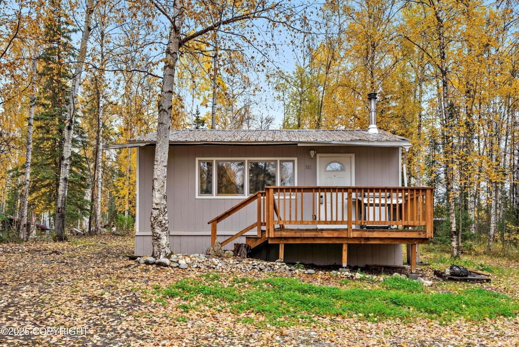 view of front of property featuring a deck